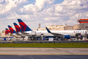 Delta Airlines aircraft lined up at the gate. Copyright © 2023 NSL Photography. All Rights Reserved.